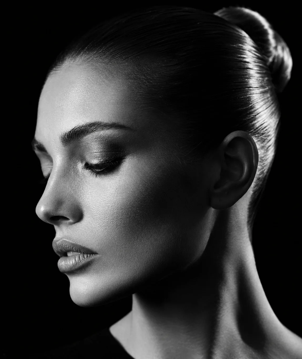Side profile portrait, developing like a darkroom photograph